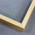 A simple 1-1/4 " deep shadow box frame with a natural wood finish.
1-1/4" wide: ideal for small images.
