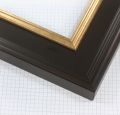 This 2-3/4 " frame features a dark mahogany finish with a gold accent lip. This frame is the perfect mix of modern and timeless to add elegance to any artwork.