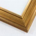 This elegant frame is finished in a dark gold leaf that highlights the natural wood grain.
2.25 " width: ideal for medium or large images. Border a rustic nature photograph, or autumnal painting or print with this simple, bucolic frame.