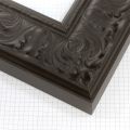 This 3-5/8 " elegant black frame features a beautifully embossed floral pattern that adds a touch of classic sophistication to any artwork or photograph. Its deep, matte finish and intricate detailing create a timeless, luxurious look perfect for both modern and traditional interiors.